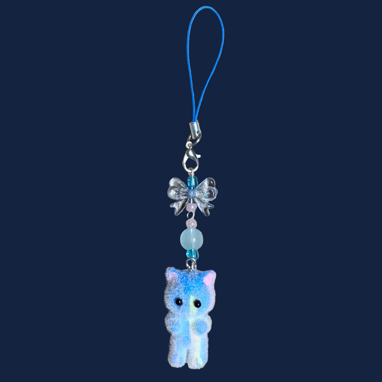 Fuzzy cat phonecharm ~blue marble