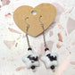 Bat star dangle earrings