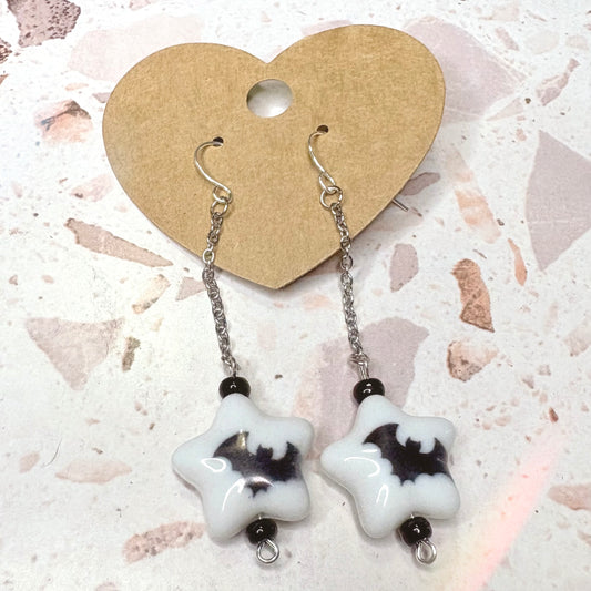 Bat star dangle earrings