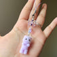 Fuzzy cat phonecharm ~ purple