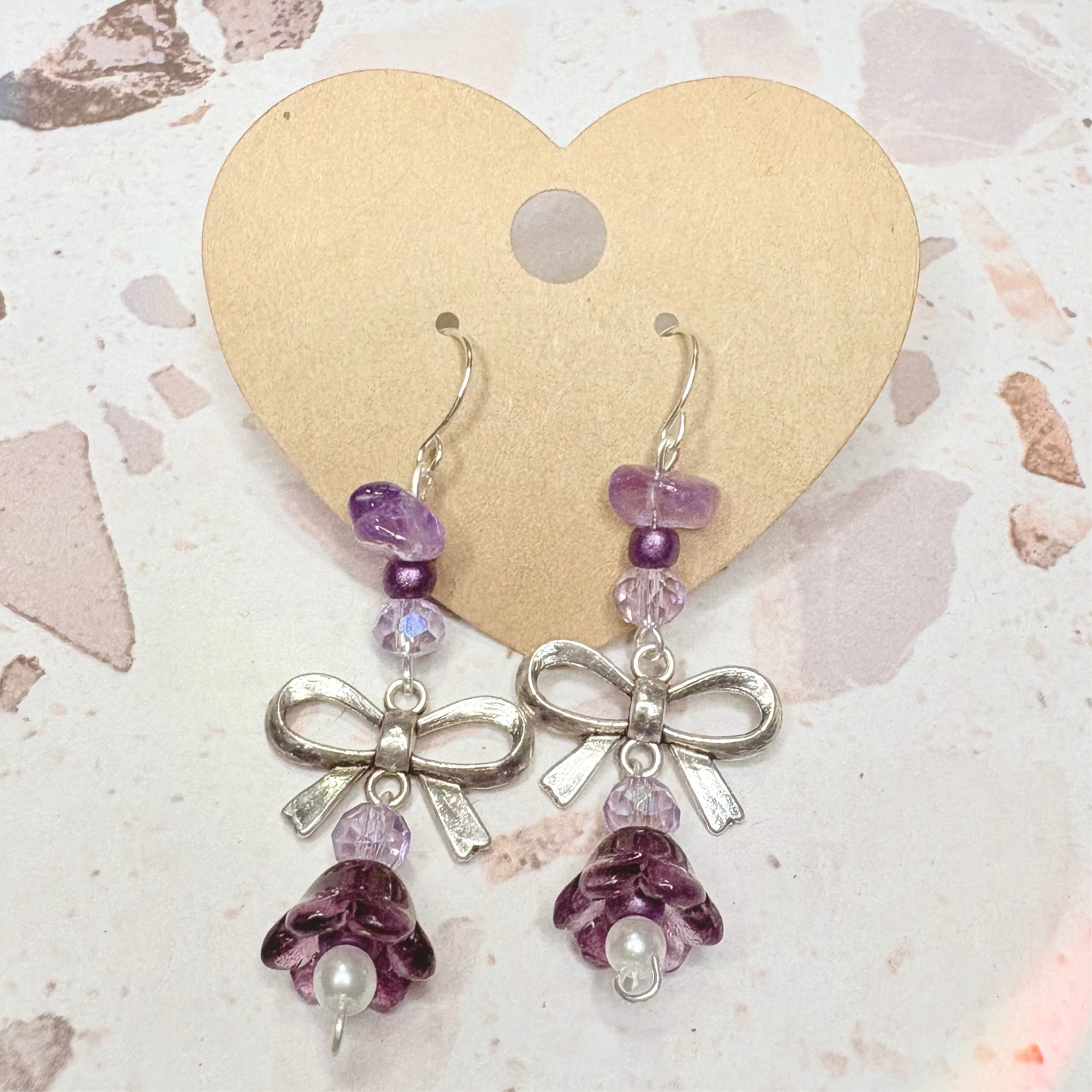 Amethyst bow dangle earrings
