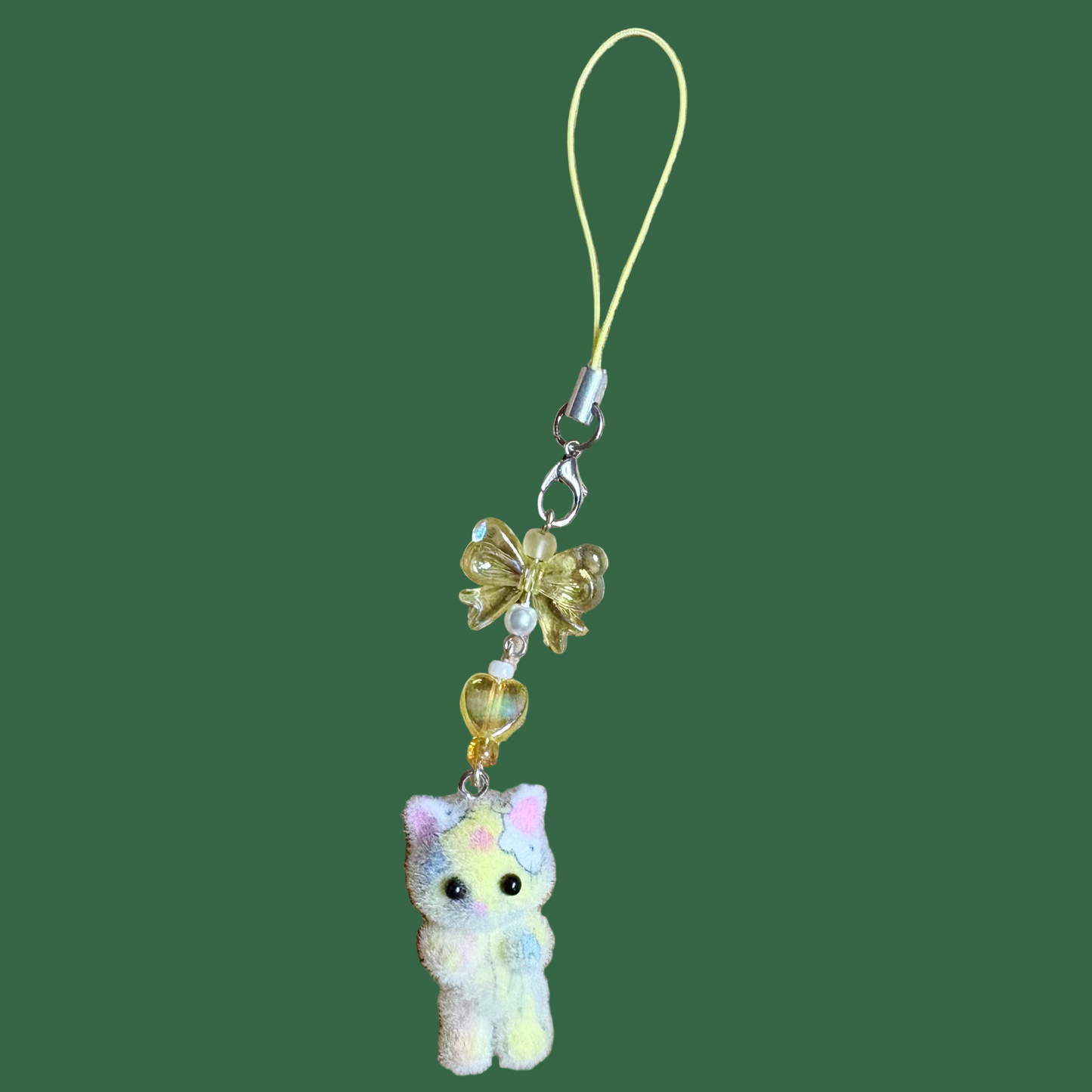 Fuzzy cat phonecharm ~ yellow marble