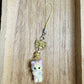 Fuzzy cat phonecharm ~ yellow marble